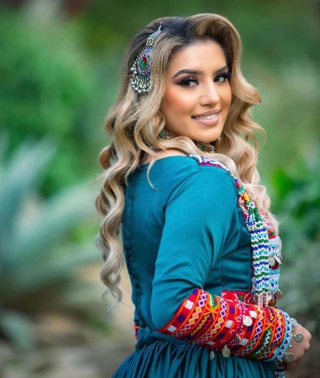 Bride in traditional afghan clothing.