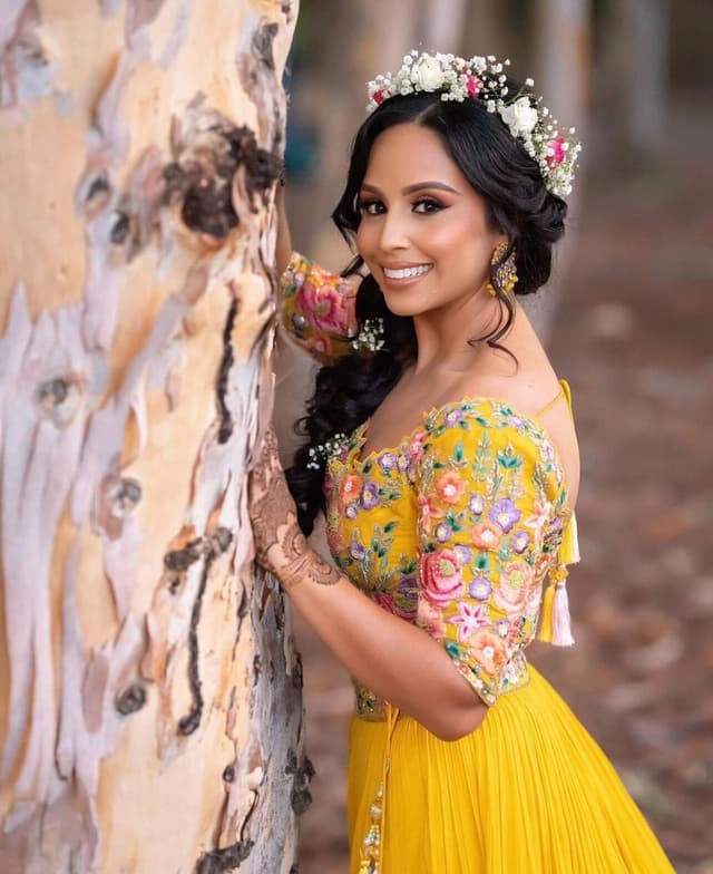 Bride with wedding dress, smiling with roko and shak.